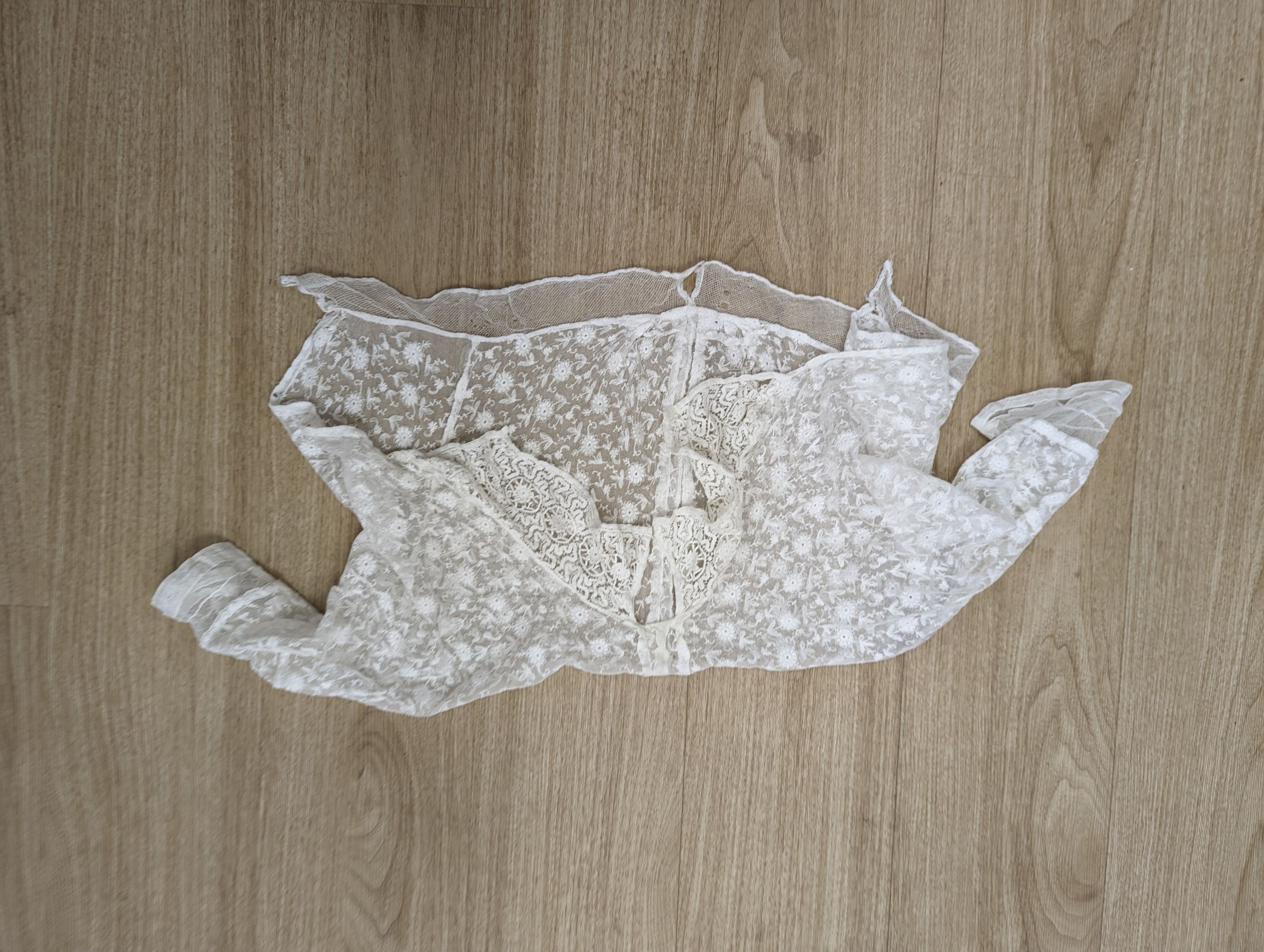 A lace jacket and five fine net and lace Edwardian ladies blouses.